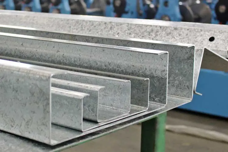 Close-up of nested galvanized C purlins in several sizes