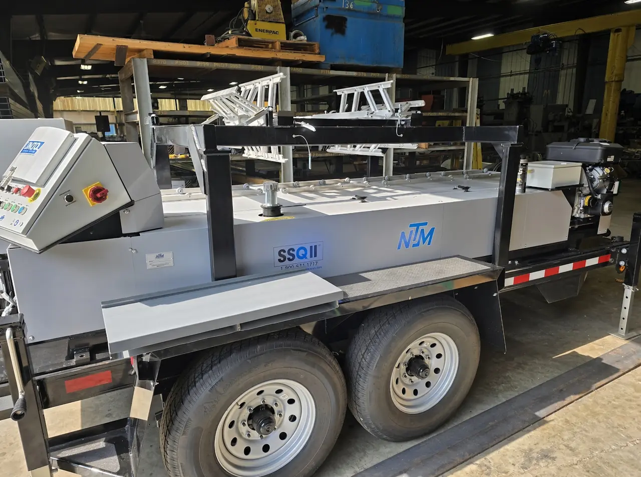 Falcon's trailer-mounted New Tech Machinery SSQ II standing seam roll former